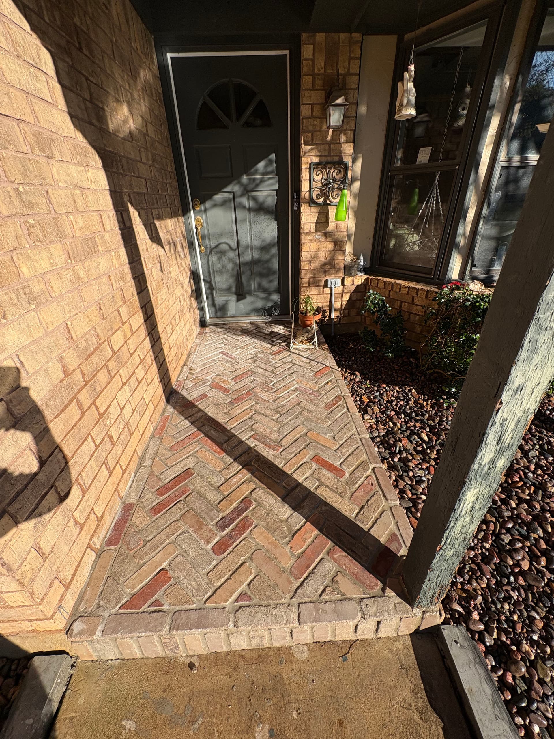 Gallery photos for Elegant Landscaping with Herringbone Porch and Rock Beds: Image #3