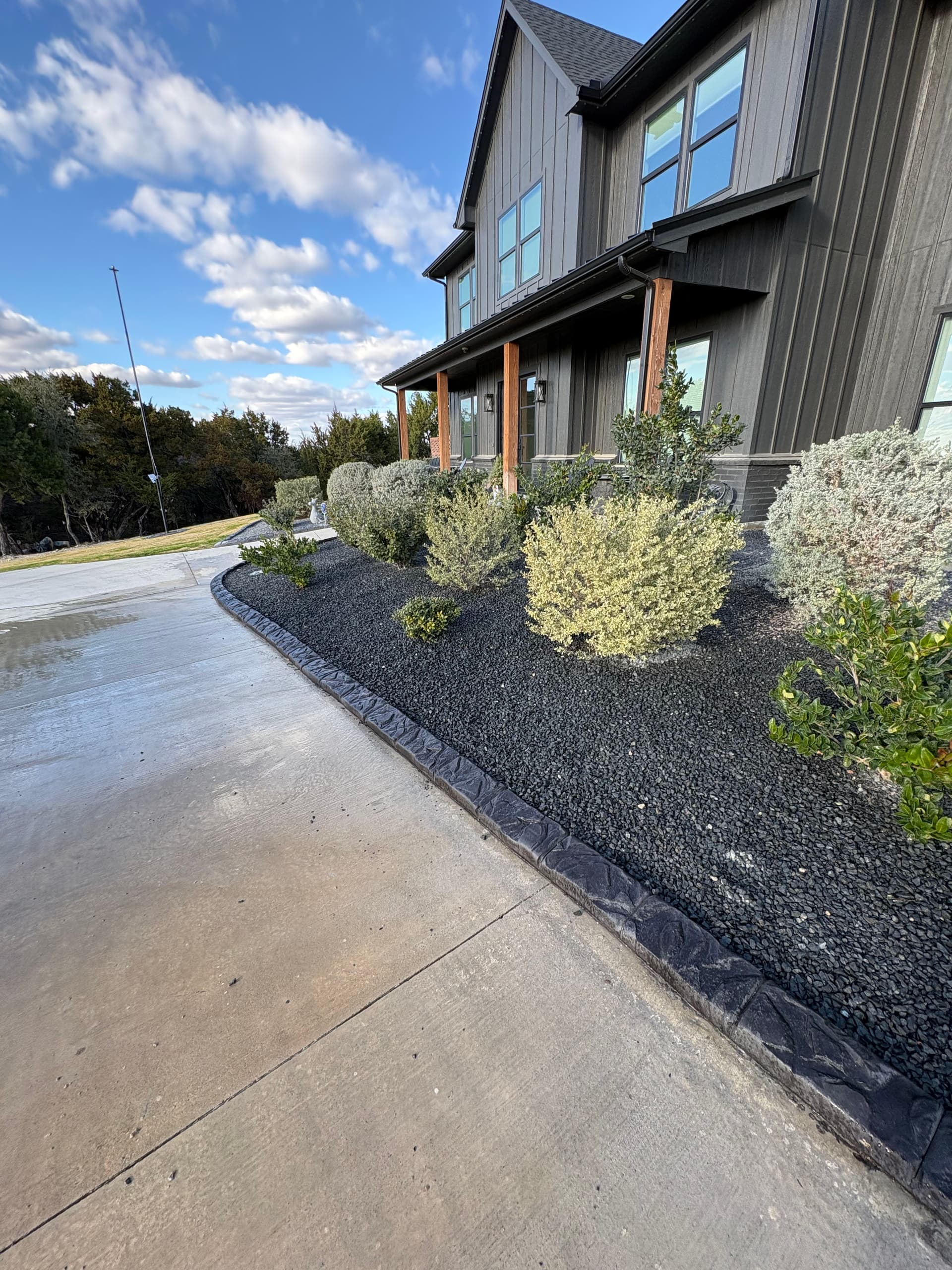 Elegant Landscaping Upgrade with Tejas Black Rocks