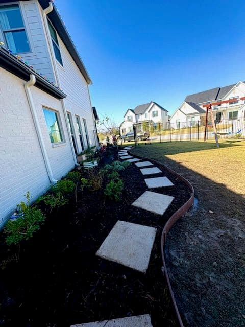 Aledo Yard Enhancement with Pavers and Flowerbeds image